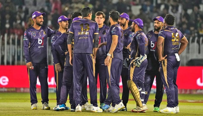 Quetta Gladiators players in a huddle in a game against Islamabad United on March 5, 2023.—TwitterthePSLt20