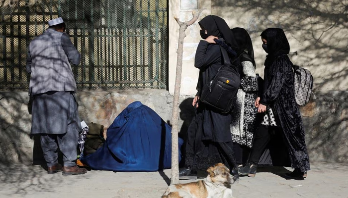 Afghan female students walk near Kabul University in Kabul, Afghanistan. — Reuters/File