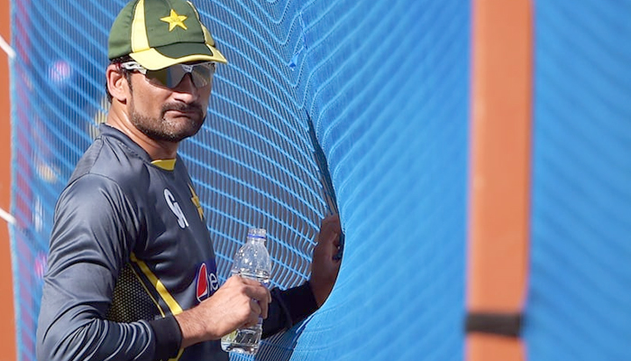 Sohail Tanvir takes a break in a net practice session at Dubai International Stadium in Dubai on December 7, 2014. — AFP/File