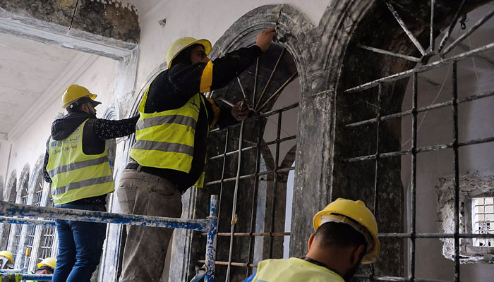 A UNESCO team works on a restoration in the Old City of Mosul, Iraq. AFP/File