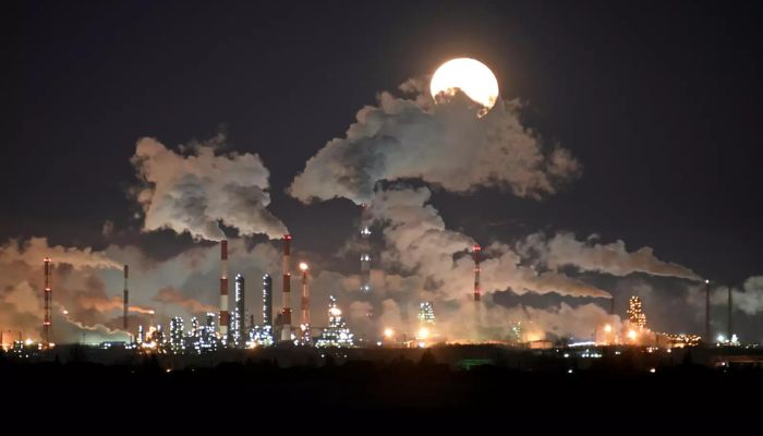 Full moon rises over the Gazprom Nefts oil refinery in Omsk, Russia February 10, 2020.— Reuters