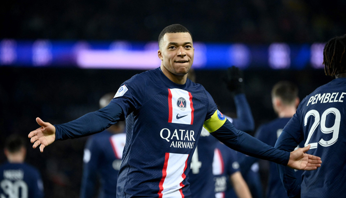 Paris Saint-Germains French forward Kylian Mbappe celebrates after he scored a goal during the French L1 football match between Paris Saint-Germain (PSG) and FC Nantes at The Parc des Princes Stadium in Paris on March 4, 2023. — AFP