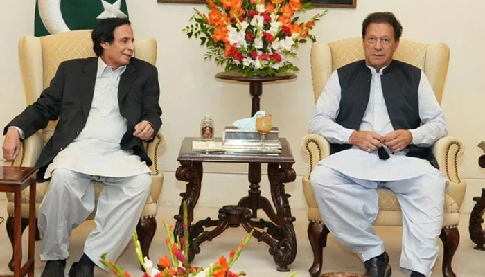 Former CM Punjab Pervaiz Elahi (left) and PTI chief Imran Khan. — Punjab Government/File