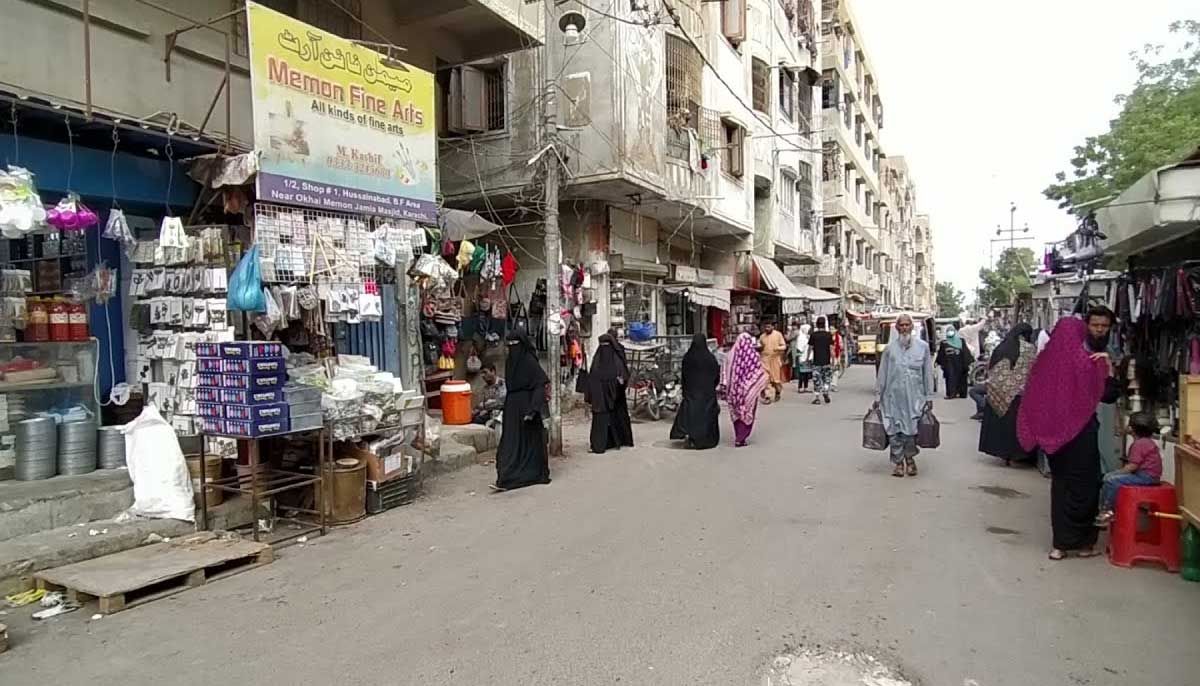 Shops located at the Memon Markaz street. — Photo by Zoha Tunio