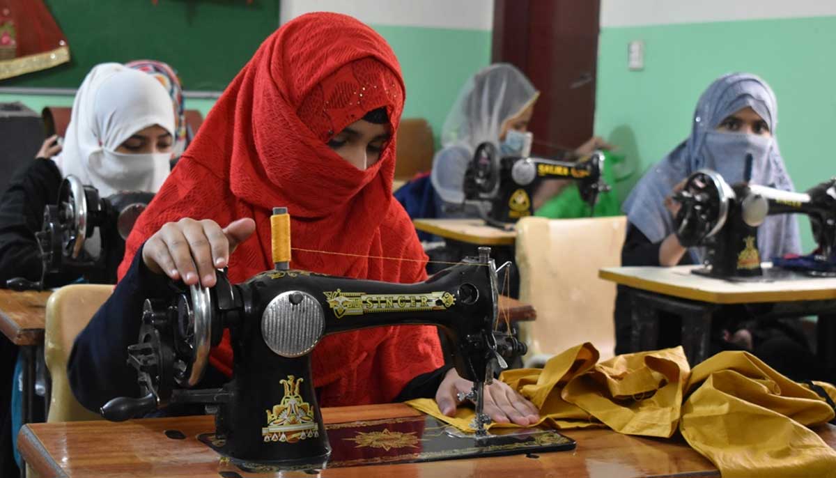 Women learn sewing at the Memon Foundation. — Photo by Zoha Tunio