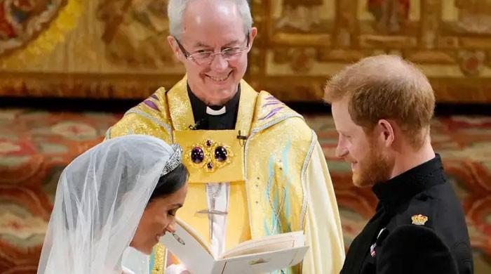 Prince Harry says archbishop hands were ‘shaking’ due to cameras at wedding