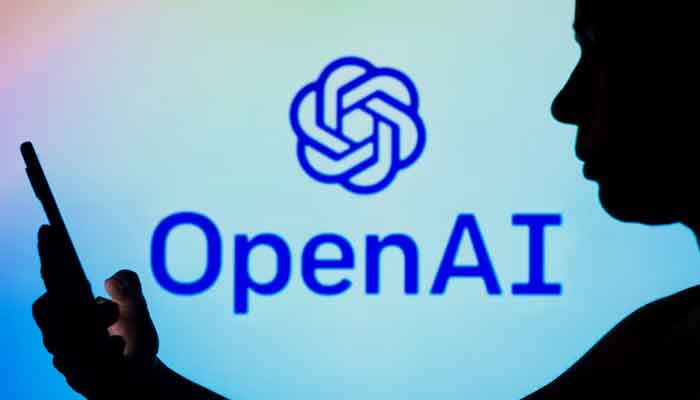 The picture shows a person using phone with OpenAI logo in the background. — Reuters