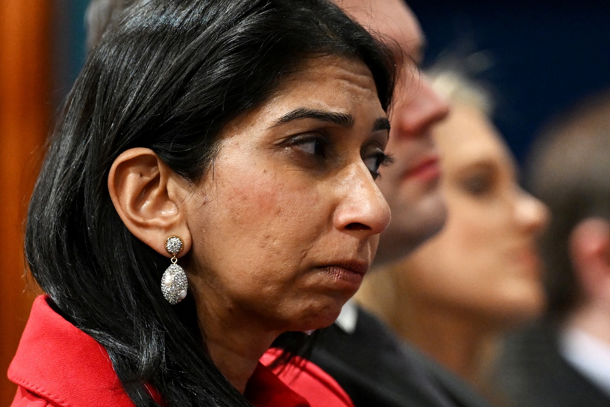 Home Secretary Suella Braverman listens as Prime Minister Rishi Sunak speaks during a press conference following the launch of new legislation on migrant channel crossings at Downing Street on March 7, 2023 in London, United Kingdom.— Reuters