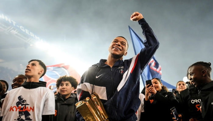 Kylian Mbappe was hailed as a hero by the Parc des Princes after becoming Paris Saint-Germains all-time top scorer at the weekend. AFP/File