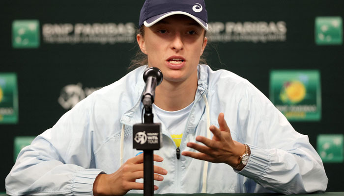 Iga Swiatek of Poland fields questions from the media during the BNP Paribas Open at the Indian Wells Tennis Garden on March 08, 2023 in Indian Wells, California. AFP