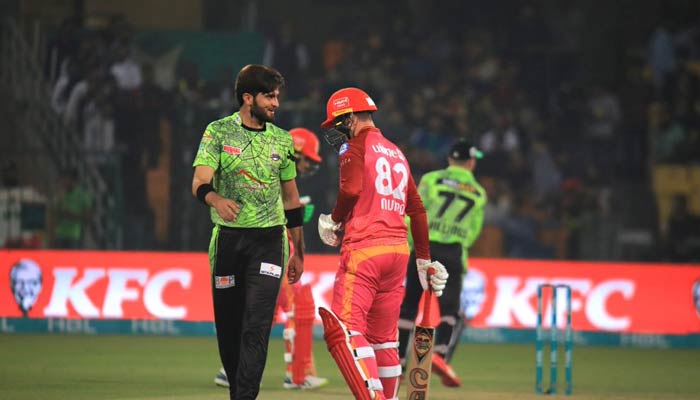 Lahore Qalandars captain Shaheen Shah Afridi and an Islamabad United batter during the 16th match of the eighth season of the Pakistan Super League (PSL) at the Gaddafi Stadium in Lahore on February 27, 2023. — PSL