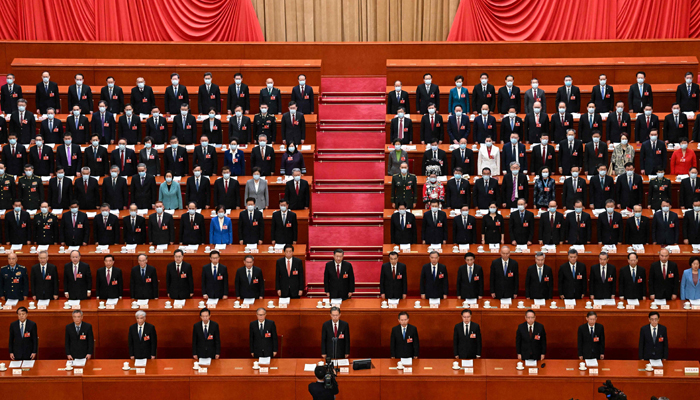 President Xi Jinping (C) and other Chinese leaders sing the national anthem during the opening session of the National Peoples Congress (NPC) at the Great Hall of the People in Beijing on March 5, 2023. — AFP