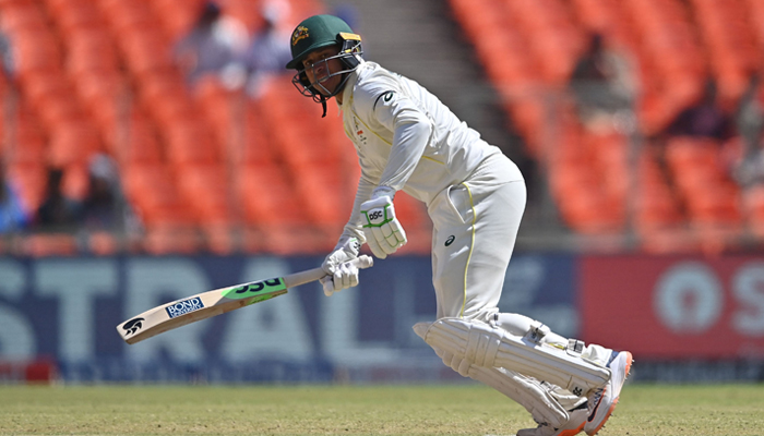 Australias Usman Khawaja plays a shot during the second day of the fourth and final Test cricket match between India and Australia in Ahmedabad on March 10, 2023. — AFP