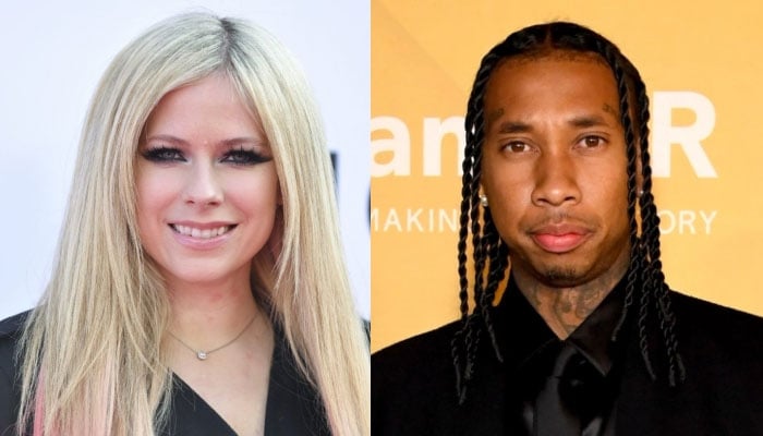 Avril Lavigne and Tyga look all loved up in dinner date in matching bomber jackets