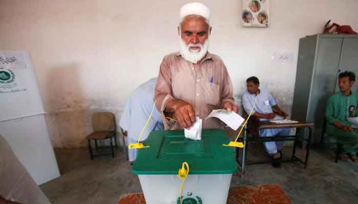 A voter casts his vote at a polling station during the first provincial elections in Jamrud, Pakistan on July 20, 2019. — Reuters