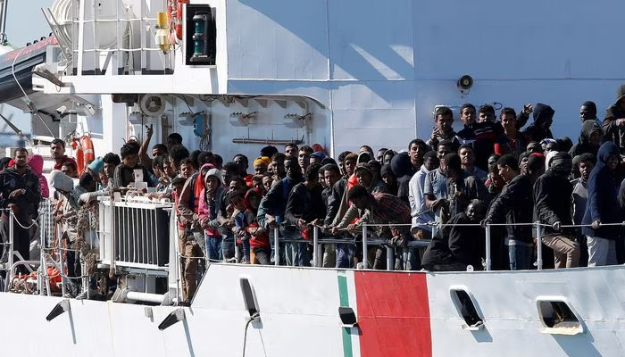 Migrants arrive by the Italian coastguard vessel Peluso in the Sicilian harbour of Augusta, Italy, on May 13, 2016. — Reuters/File