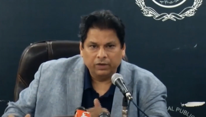 Punjab caretaker Information Minister Amir Mir addresses a press conference in Lahore on March 12, 2023, in this still taken from a video. — YouTube/GeoNews