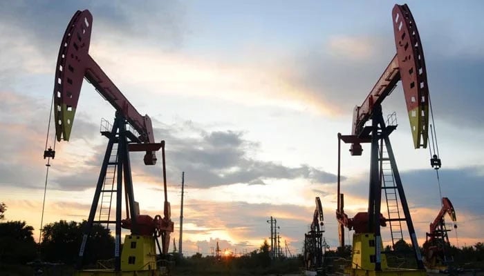 Pumpjacks are seen during sunset at the Daqing oil field in Heilongjiang province, China August 22, 2019. — Reuters