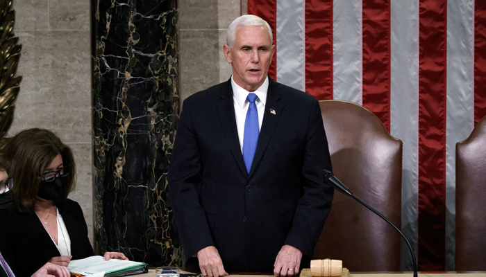 Former US Vice President Mike Pence reads the final certification of Electoral College votes during a joint session of Congress, at the Capitol in Washington, US. — Reuters/File