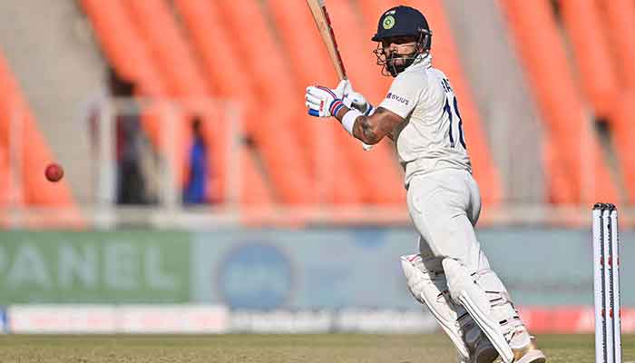 India´s Virat Kohli plays a shot during the third day of the fourth and final Test cricket match between India and Australia at the Narendra Modi Stadium in Ahmedabad on March 11, 2023. — AFP