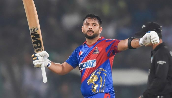 Karachi Kings Muhammad Akhlaq celebrates after scoring a half-century (50 runs) during the Pakistan Super League (PSL) Twenty20 cricket match between Karachi Kings and Lahore Qalandars at the Gaddafi Cricket Stadium in Lahore on March 12, 2023. — AFP