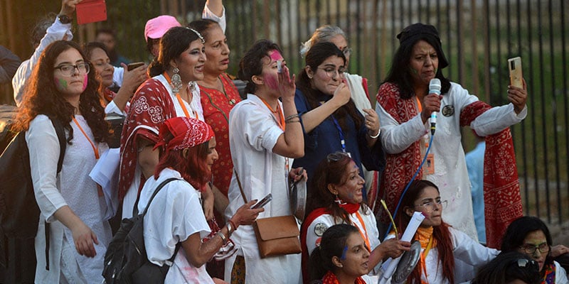 People take part in Aurat March or women´s march in Karachi on March 12, 2023. — AFP