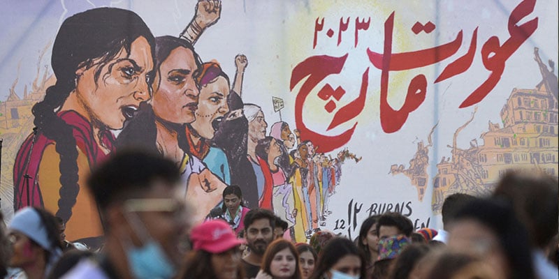 People take part in Aurat March, an annual socio-political demonstration, in Karachi on March 12, 2023. —AFP