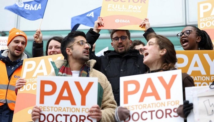 Junior doctors protest over low wages in London. — Reuters