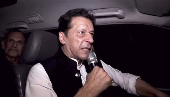 PTI Chairman Imran Khan addresses party workers in Lahore on March 13, 2023, in this still taken from a video. — Twitter/PTIOfficial