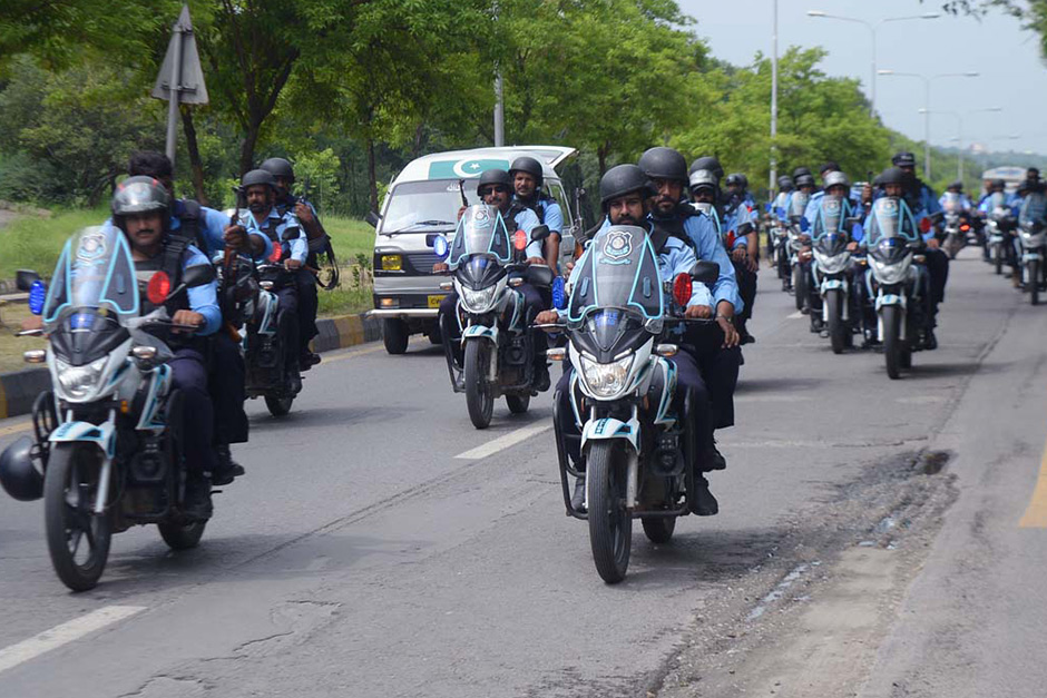 Islamabad police conduct a flag march in the federal capital, on August 5, 2023. — APP