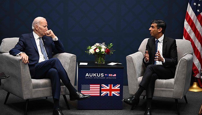 British Prime Minister Rishi Sunak (R) speaks alongside US President Joe Biden during a bilateral meeting at the AUKUS summit on March 13, 2023, at Naval Base Point Loma in San Diego California. AUKUS is a trilateral security pact announced on September 15, 2021, for the Indo-Pacific region. —AFP