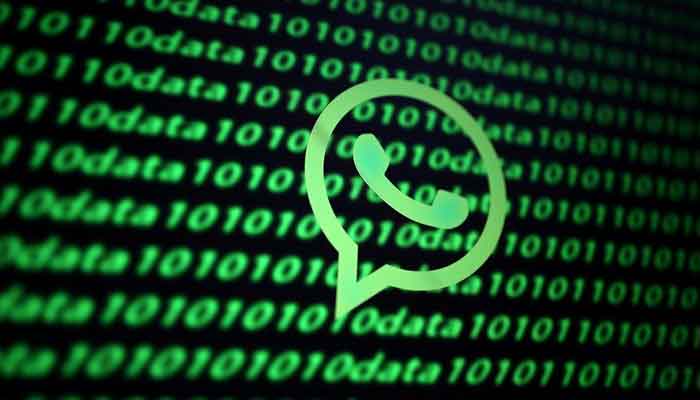 The Whatsapp logo and binary cyber codes are seen in this illustration taken November 26, 2019. — Reuters