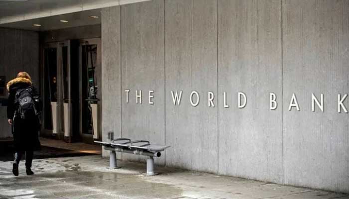 A person enters the building of the Washington-based global development lender, The World Bank Group, in Washington. — AFP/File
