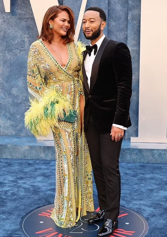 Chrissy Teigen, John Legend step out on glam date night at 2023 Oscars after-party