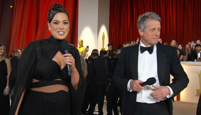 Hugh Grant draws flak for Oscars red carpet interview