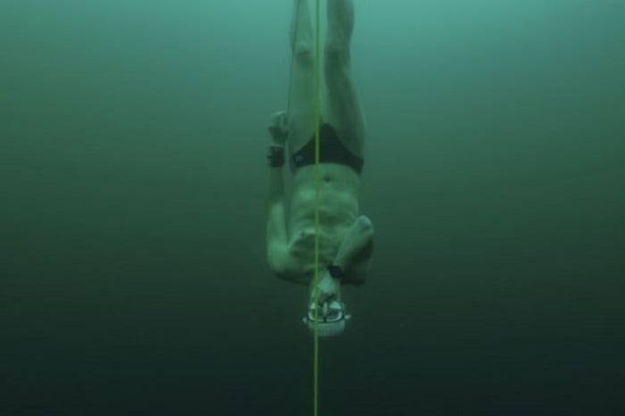 Czech freediver David Vencl dives to 52 metres under the ice of Lake Sils in one breath and wearing only a swimsuit in this picture taken from a video in Sils near St. Moritz, Switzerland March 14, 2023.— Reuters