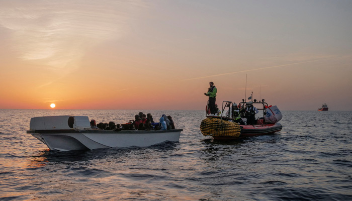 Migrants wait to be rescued by crew members of NGO rescue ship Ocean Viking in the Mediterranean Sea, October 26, 2022.  — Reuters