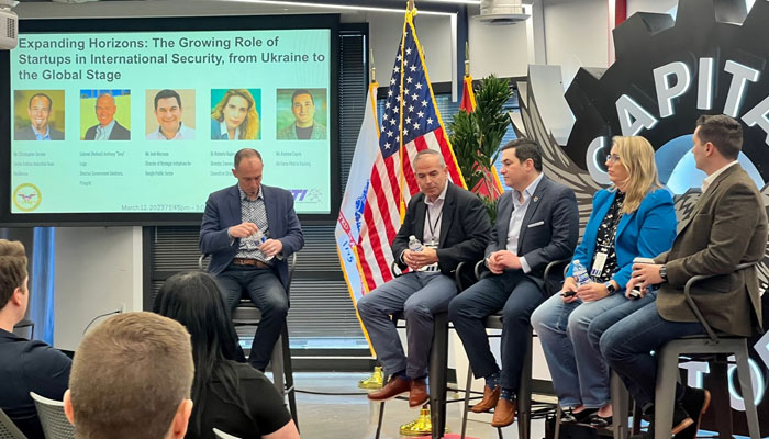 A panel is seen at a symposium that facilitated dynamic discussions around the role of startups in national and international security, supply chain resilience, and navigating the defense market.Twitter/ATI_ORG