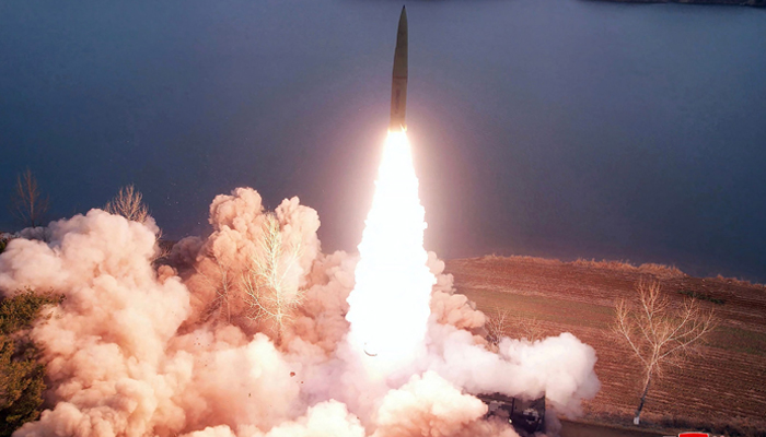 This picture shows a missile being launched by a unit of the Korean Peoples Army, in charge of operational missions on the Western Front, at an undisclosed location in North Korea on March 15, 2023. — AFP