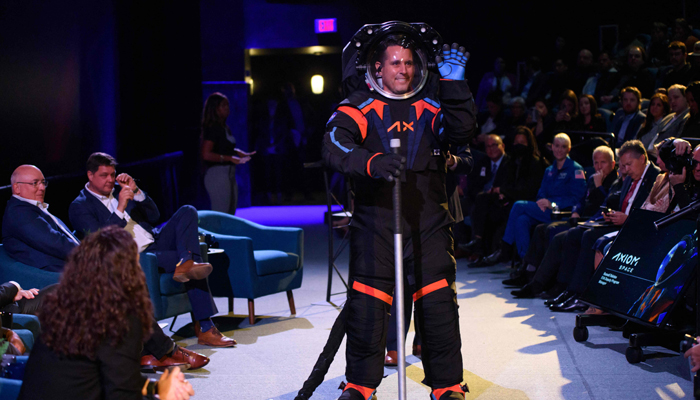 Chief Engineer Jim Stein wears the new spacesuit during the Axiom Space Artemis III Lunar Spacesuit event at Space Center Houston in Houston, Texas, on March 15, 2023. — AFP