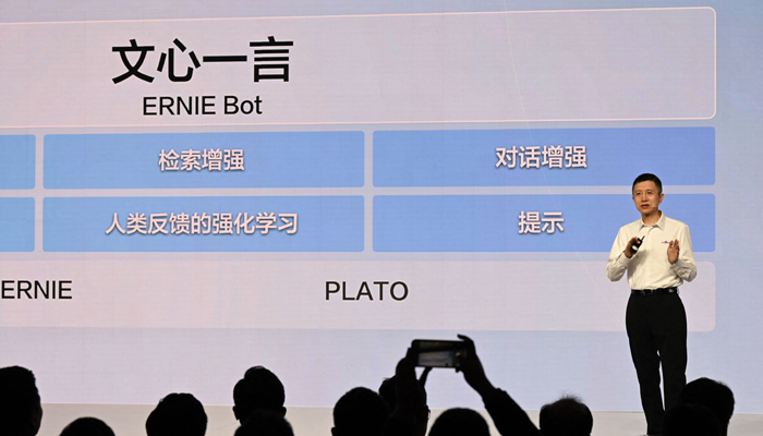 Baidu co-founder and CEO Robin Li speaks at the unveiling of Baidus AI chatbot Ernie Bot at an event in Beijing on March 16, 2023. — AFP