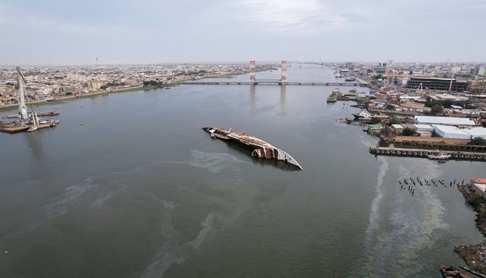 An aerial view of the Al-Mansur yacht, once belonging to former Iraqi President Saddam Hussein, which has been lying on the water bed for years in the Shatt al-Arab waterway, in Basra, Iraq . —Reuters/File