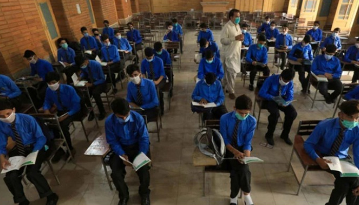 Students while sitting in an examination hall during their papers. — Reuters/File