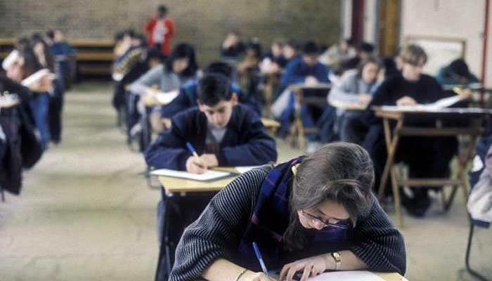 In this picture, students can be seen attempting their exams. — Online/File