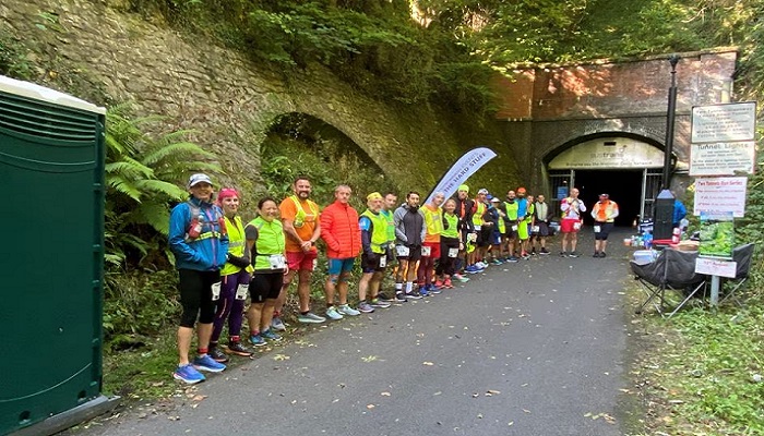Runners pose for a photograph after The Tunnel, a 200 mile (322 km) run inside the Combe Down Tunnel in Bath, Britain September, 2021. — Reuters