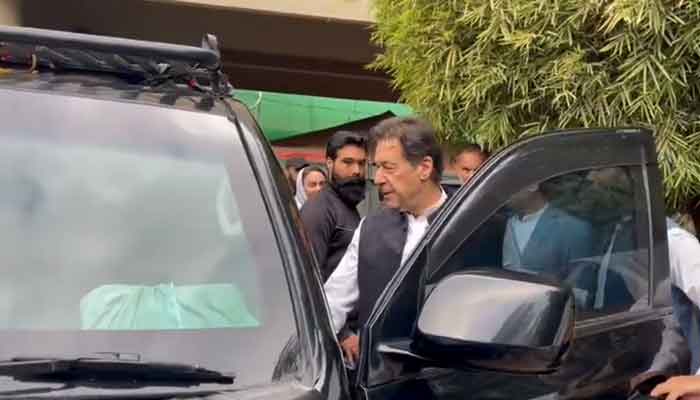 PTI chief Imran Khan departs for Islamabad from Lahore, on March 18, 2023. — Twitter/PTI