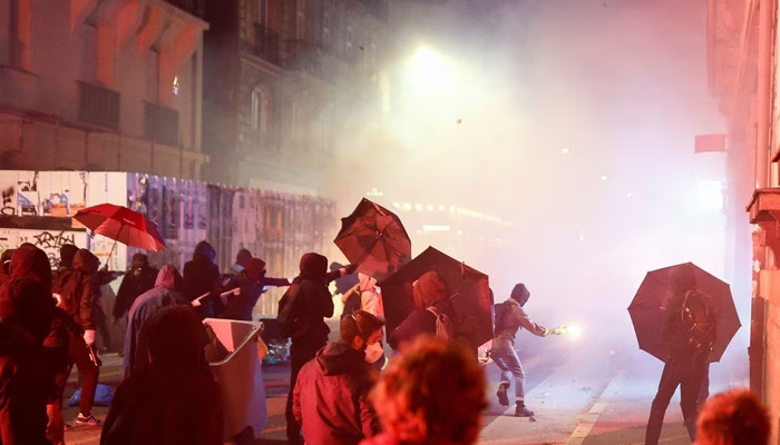 Demonstrators take part in a protest against the pensions reform bill in Nantes, France on March 16, 2023. — Reuters