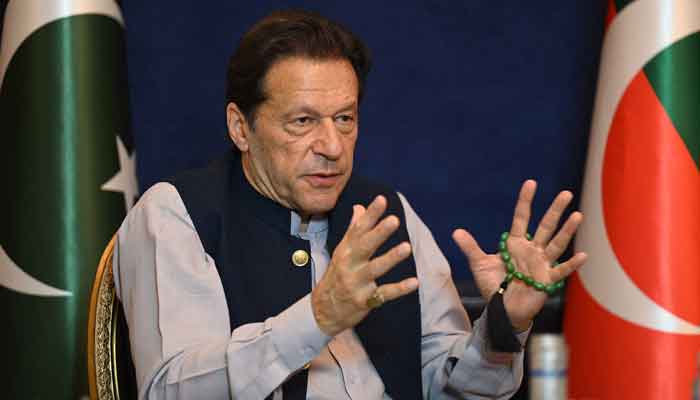 Former prime minister Imran Khan speaks during an interview at his residence in Lahore on March 15, 2023. -AFP