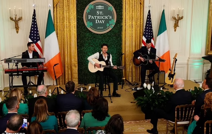 Niall Horan performs at the White House and shares a laugh with President Biden