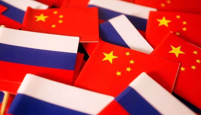 Flags of China and Russia are displayed in this illustration picture. — Reuters/File
